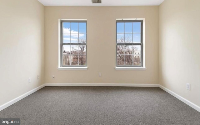 view of carpeted spare room