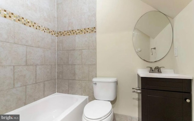 full bathroom with vanity, toilet, and tiled shower / bath combo