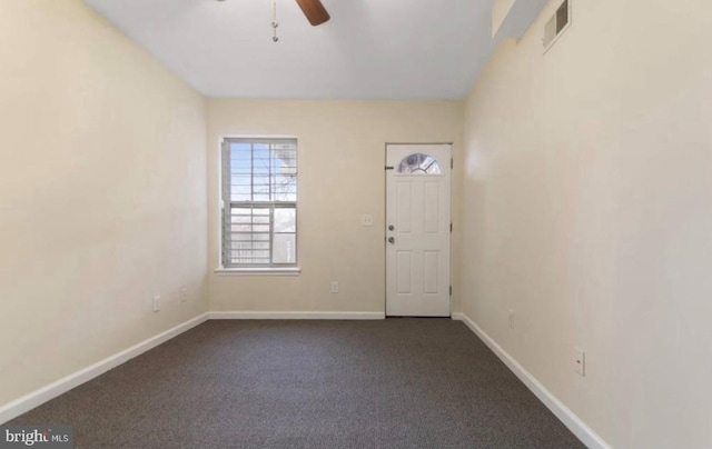 interior space featuring ceiling fan