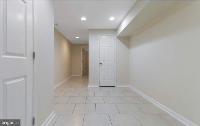 interior space with light tile patterned floors