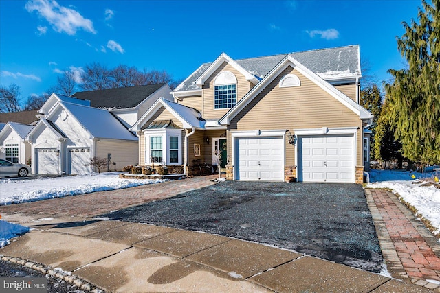 front of property with a garage