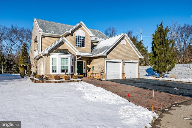 front of property featuring a garage