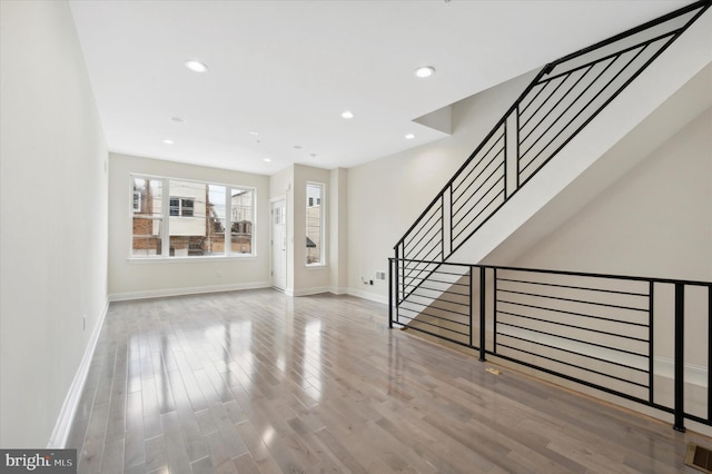 interior space with hardwood / wood-style flooring