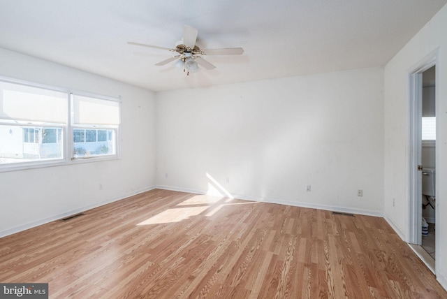 spare room with ceiling fan and light hardwood / wood-style flooring