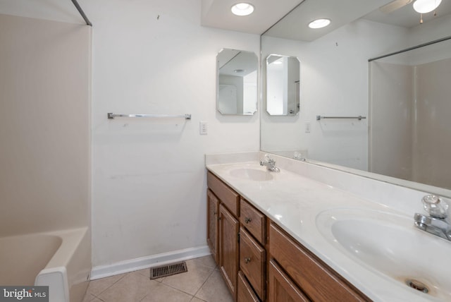 bathroom featuring tile patterned floors and vanity