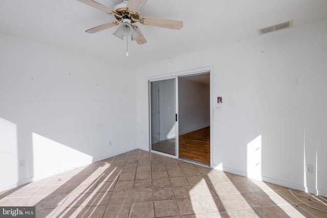 empty room with ceiling fan