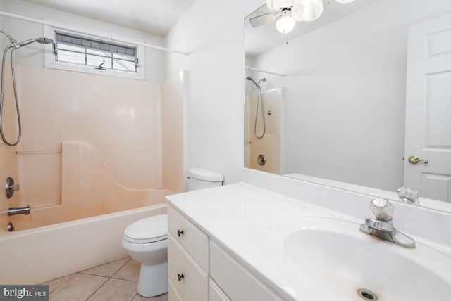 full bathroom with shower / bathing tub combination, vanity, tile patterned flooring, ceiling fan, and toilet