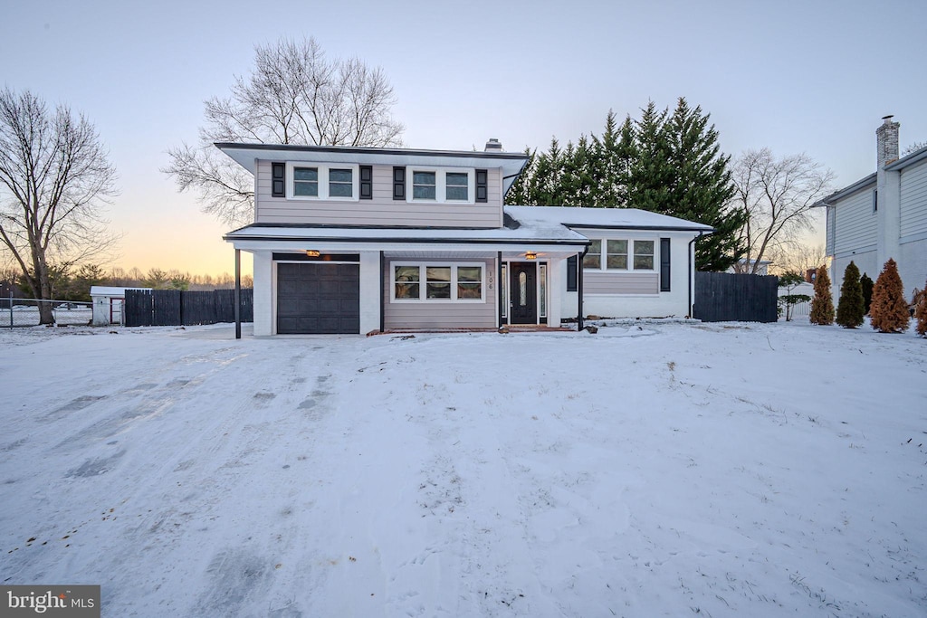 view of front property with a garage