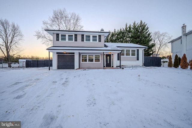 view of front property with a garage