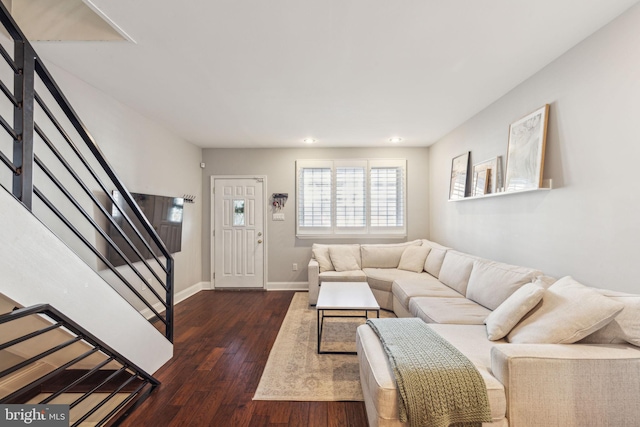 living room with dark wood-type flooring