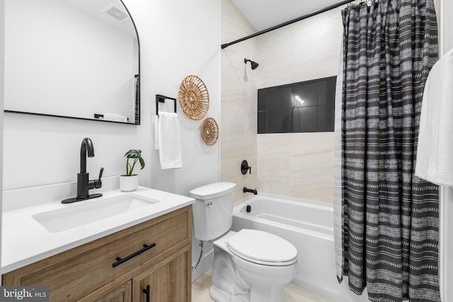 full bathroom with vanity, toilet, and shower / tub combo with curtain