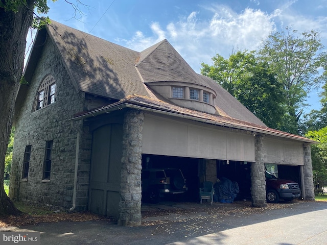 view of home's exterior with a garage