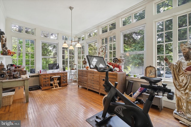 sunroom / solarium featuring plenty of natural light