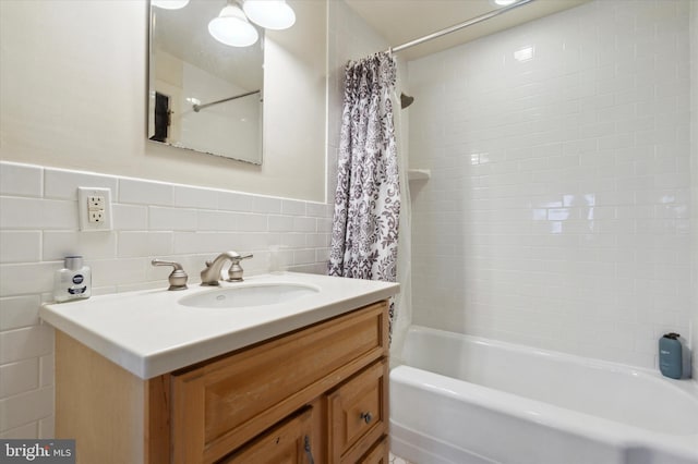 bathroom featuring vanity and shower / tub combo with curtain