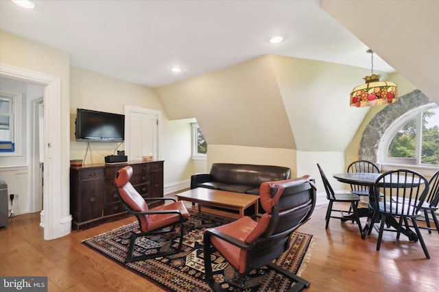 office area with hardwood / wood-style flooring and lofted ceiling