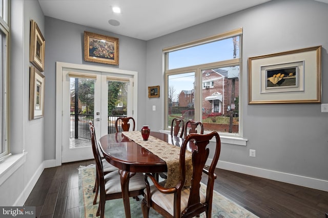 dining area featuring dark hardwood / wood-style floors and french doors