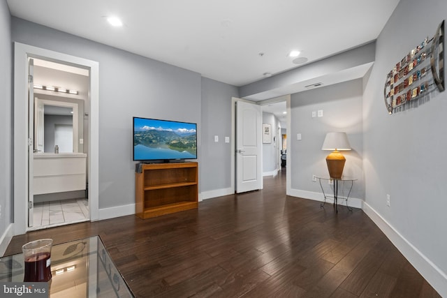 living room featuring dark hardwood / wood-style floors