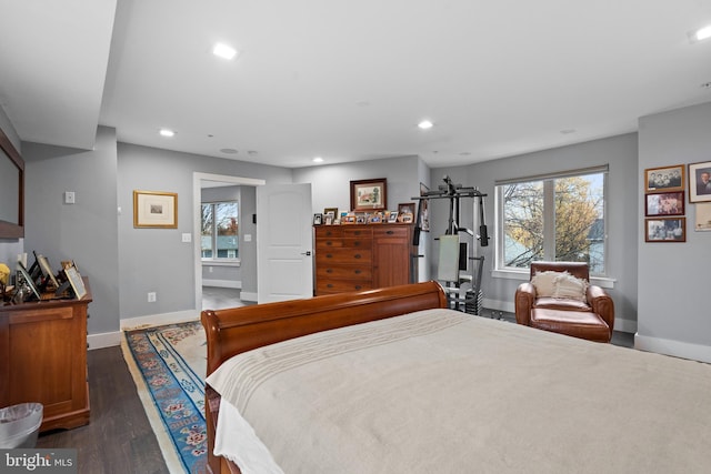 bedroom with dark wood-type flooring