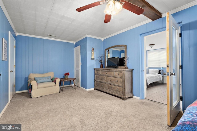 sitting room featuring light colored carpet and ornamental molding