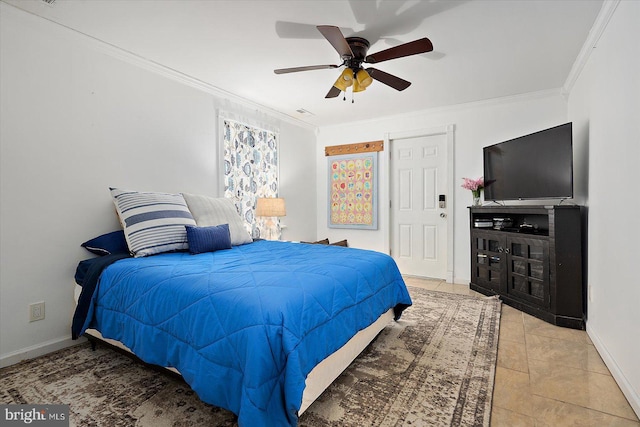 bedroom with light tile patterned floors, ceiling fan, and ornamental molding