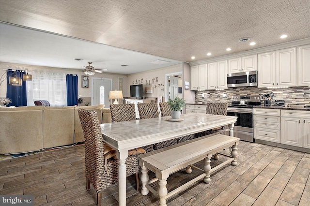 dining area featuring ceiling fan