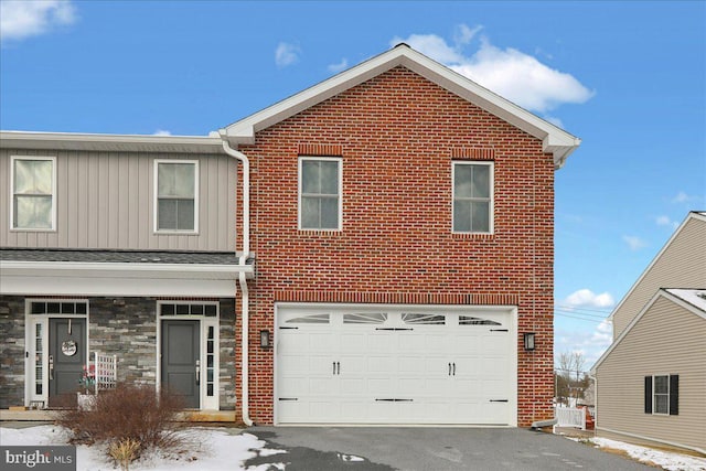 view of front of property featuring a garage