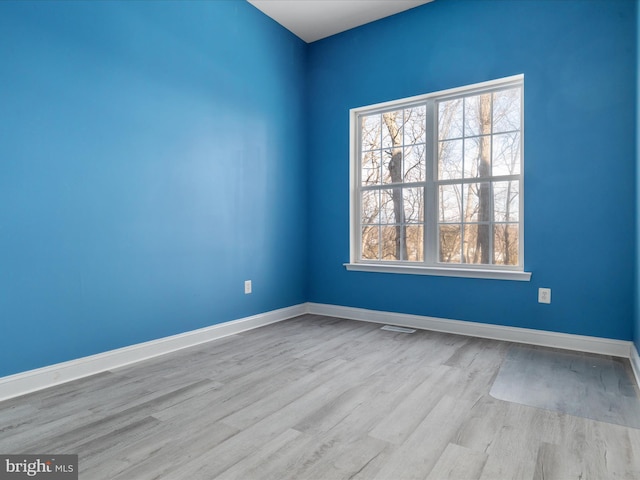 empty room featuring light hardwood / wood-style floors