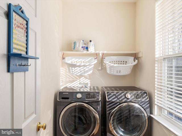 laundry area with washer and clothes dryer