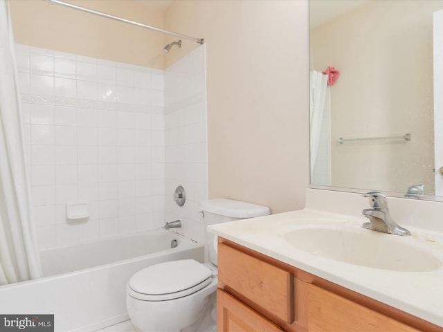 full bathroom with toilet, vanity, and shower / bath combination with curtain