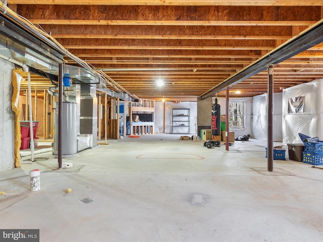 basement featuring water heater