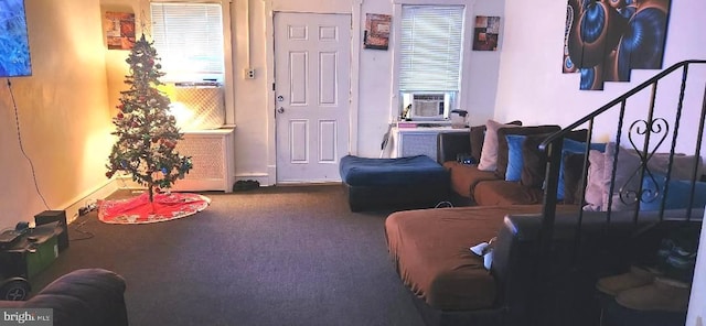 living room with carpet flooring and cooling unit