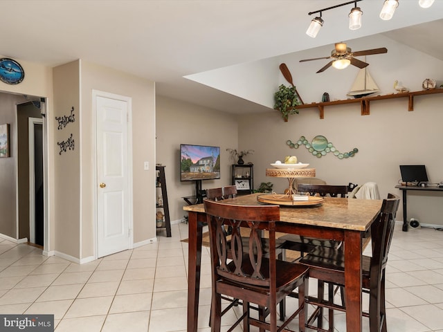 dining room featuring light tile patterned flooring and ceiling fan