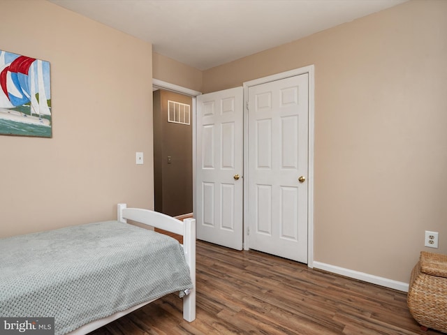 bedroom featuring hardwood / wood-style floors