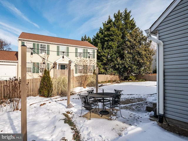 view of snow covered patio