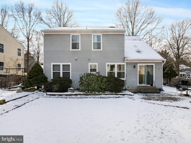 view of snow covered property