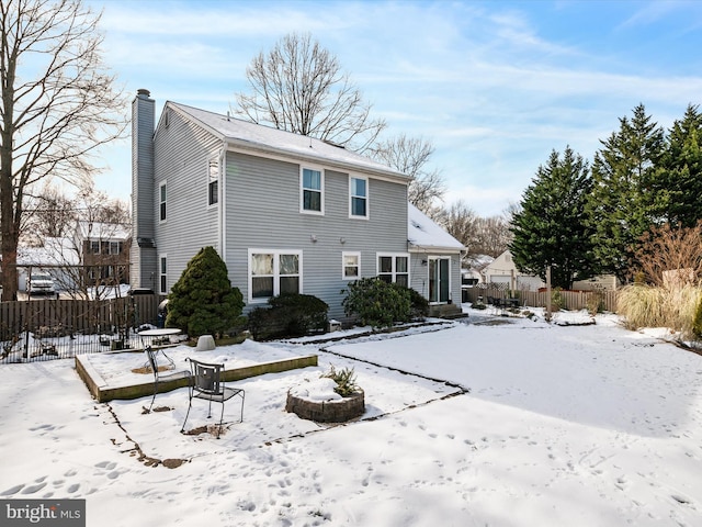 view of snow covered property