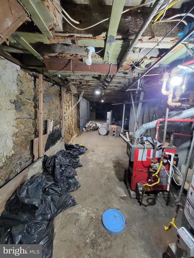 basement featuring electric water heater