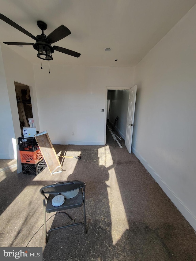 view of patio featuring ceiling fan