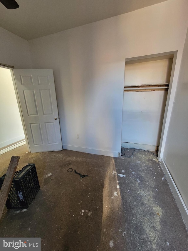 unfurnished bedroom with a closet