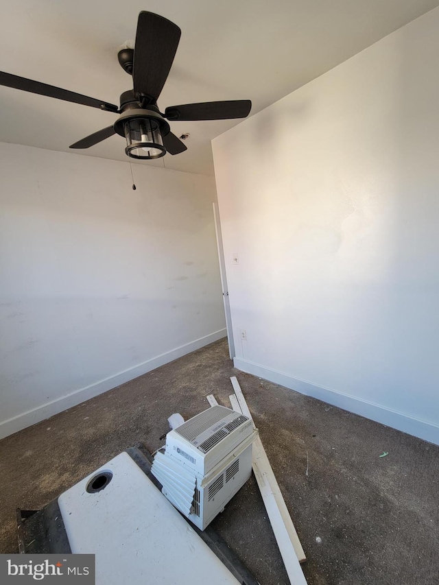 interior space with ceiling fan