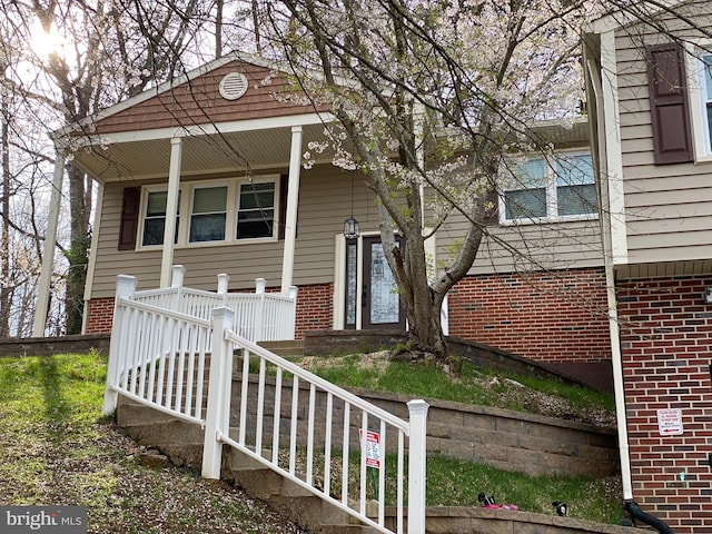 bungalow-style home with a porch