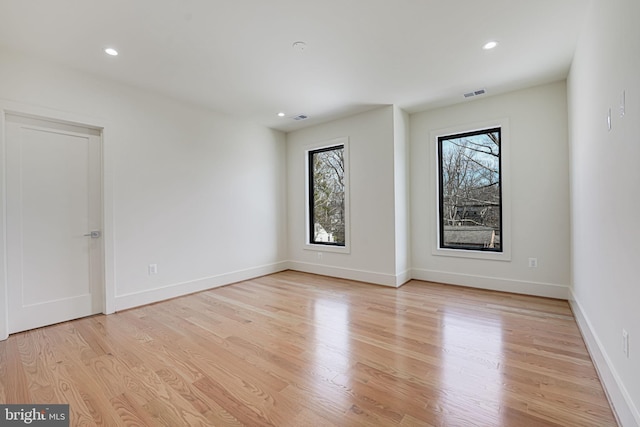 empty room featuring light hardwood / wood-style floors