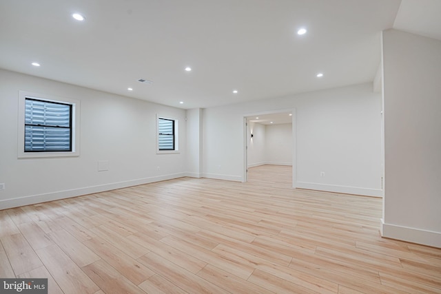 spare room with light wood-type flooring