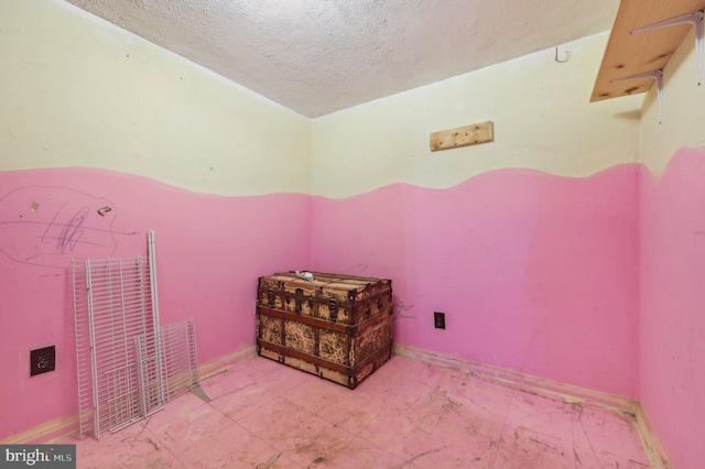 bedroom with a textured ceiling