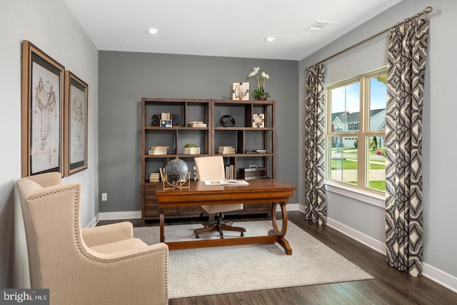 office space featuring dark hardwood / wood-style flooring