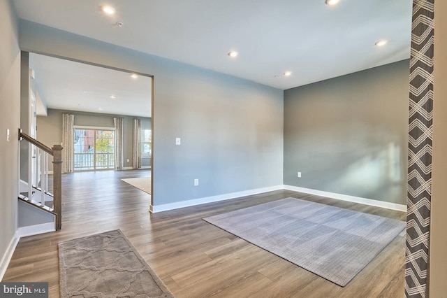 empty room featuring hardwood / wood-style floors