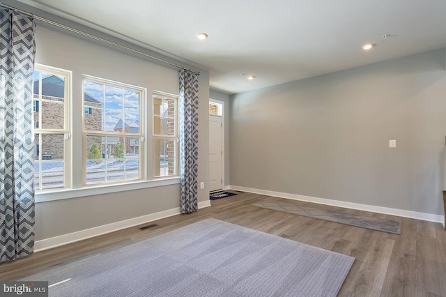 empty room featuring hardwood / wood-style floors