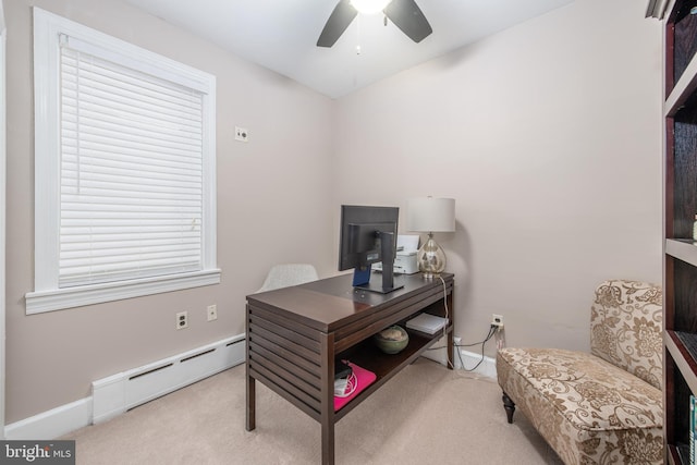 home office with ceiling fan, baseboard heating, and light carpet