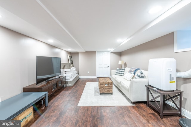 living room featuring dark hardwood / wood-style flooring