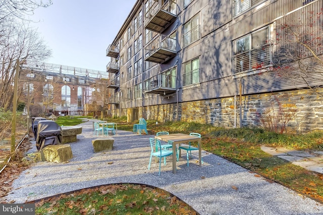 view of community with a patio